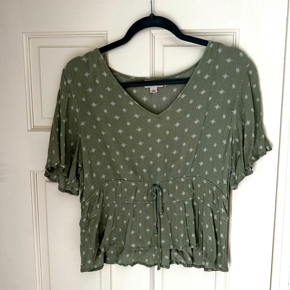 green patterned blouse